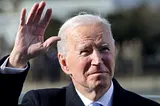 President Joe Biden waves after being sworn in on Wednesday.