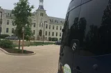 My van/home parked outside the former Joliet Franciscan Motherhouse, now part of the University of St. Francis.