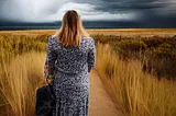 AI created image of a woman looking at the approaching storm, knowing her sinus headache pain is coming, created from NightCafe Creator AI