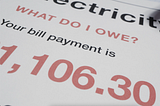 This is a picture of a utility bill. It says “What do I owe?” and has a large amount in big read numbers.