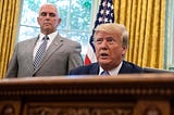 President Donald Trump speaks to the press as Vice President Mike Pence looks on in the Oval Office.