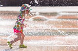 a child playing in cool water in the summer. breasts, weather, this happended to me