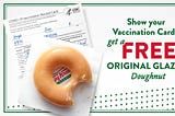 A promotional graphic with a partially eaten Krispy Kreme doughnut above a Covid-19 vaccination card, next to the text “Show your Vaccination Card, get a FREE Original Glaze Doughnut”