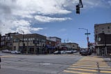 View of the corner of Irving and 19th, taken from the crosswalk.