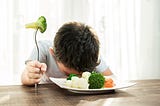 The Scientific Reason Your Kid Hates Green Foods