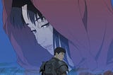 A poster for Jin-Roh: The Wolf Brigade features Kazuki Fuse — a soldier with short black hair, wearing a black, semi-dystopian armored uniform minus helmet, holding a machine gun in one hand and his helmet in the other — turned three-quarters away. The background looks like a wasteland with piles of rubble. A  transparent image of Kei Amemiya — a young woman with dark hair wearing a red jacket with a hood — takes up the middle ground, with her face taking up the top portion.