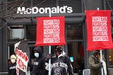 Demonstrators participate in a protest outside of McDonald’s corporate headquarters on January 15, 2021 in Chicago, Illinois.