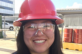 A photo of Known data scientist and media buyer Valerie Gono in a hardhat