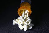 Oxycodone pain pills prescribed for a patient with chronic pain lie on display