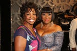 Gladys Knight and Patti Labelle pose for a photo together at an event.