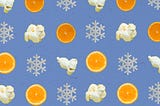 A background type pattern design consisting of orange slices, popcorn, and snowflakes on a blue background