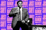 SNL cast member Kenan Thompson performing with the text “Just Rankin’ Shit” behind him in the background.