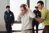 Dacre Montgomery and Bill Skarsgård in Dead Man’s Wire | Credit: Row K Entertainment
