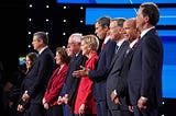 Democratic presidential candidates standing on stage at the beginning of the Democratic Presidential Debate on July 30, 2019.