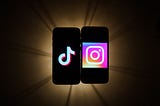 TikTok and Instagram logos are seen displayed on a phone screens in this photo illustration.