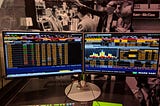 A Bloomberg Terminal on a desk.