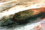 Olympus Mons, a Martian volcano, photographed by the Viking 1 spacecraft from 5000 miles away.