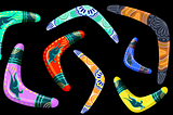 Colorful boomerangs arranged in a circular pattern on a black background, symbolizing Boomers sharing their stories of being on the rebound in life.
