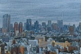 A watercolor style photograph of a city skyline.