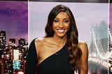 A photo of Maria Taylor at the news desk.