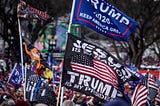 Trump supporters flying flags near the U.S. Capitol following the Stop the Steal rally on January 6, 2021 in Washington, DC.