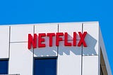 A view of the Netflix logo on the exterior of its corporate office at Sunset Bronson Studios in Los Angeles.