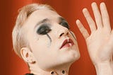 person-posing-in-art makeup