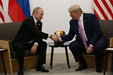 Russian President Vladimir Putin shaking hands with US President Donald Trump at the G20 summit in 2019.