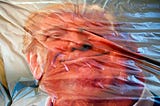 A big mat with a photograph of United States president Donald Trump