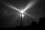 A lighthouse in the dark
