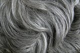 A Special Kind of Stress Is Turning Your Hair Gray