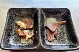Thin slices of narezushi and heshiko.