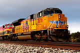 Color photo of a bright orange Union Pacific diesel locomotive