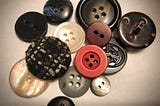 A collection of buttons of different types.