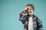 A boy smacking his head