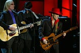Prince performs along with Tom Petty at the 19th Annual Rock and Roll Hall of Fame Induction Ceremony in New York City, 2004.