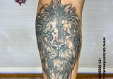 Bold Blue Eyes Lion Tattoo from Tattooinkmaster