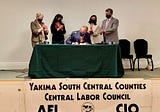 Inslee signs worker protection legislative package in Yakima