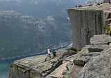 Tourists at Preikestolen above Lysefjord, Norway