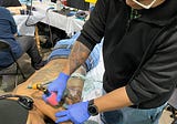 Tattoo artists flock to Philly