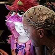 J P