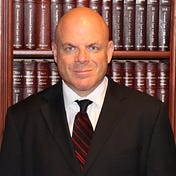 The Law Offices of Greg Prosmushkin P.C.