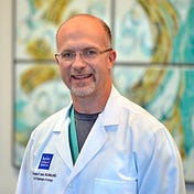 Dr. Christopher Smith