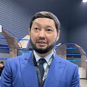 Kenes Rakishev Info