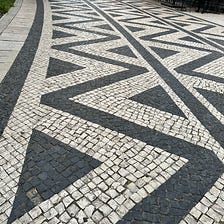 Portugal: Arrange Stones Into a Pattern For Pavement