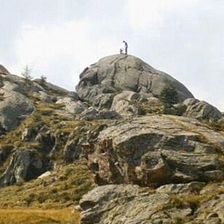 Extraterrestrial Beings Spotted Atop Large Rock In Italy