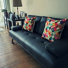 For This Gay Couple: Love Is a Modern-Day Couch With Multicolored Throw Pillows