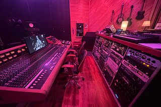 recording studio with sound isolation, control room and live room