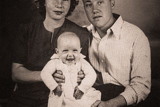 A photo of 1940s era couple with young baby as in Patrick Ryan’s novel, Buckeye.