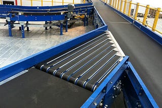 Warehouse Conveyor Systems: Choosing the Right One for Your Facility | Damon